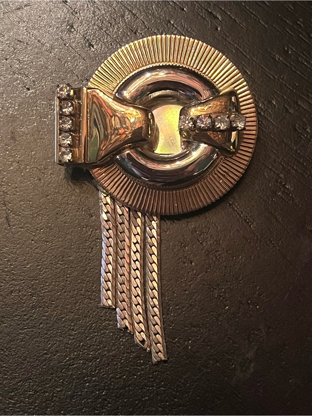 Vintage Gold-Tone Circular Rhinestone Fringe Brooch abstract